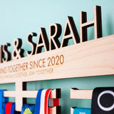 Laser Cut Personalised Medal Hanger for Couples, with brushed aluminium wall mount fixings included