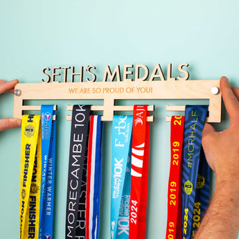 Personalised Medal Hanger with your chosen name cut out on top, and (up to) two lines of an engraved mesage