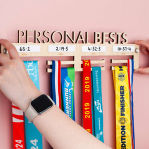 Personalised 'Personal Bests' Medal Hanger, with up to four drywipe sections to record best times for up to four distances