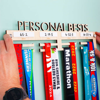 Laser Engraved and Laser Cut Personalised 'Personal Bests' Wooden Medal Hanger with four dry wipe sections to record personal best times for four events