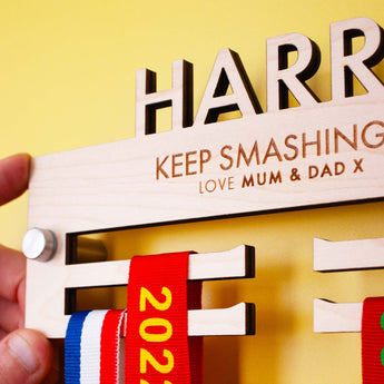 Laser engraved and Laser Cut Personalised Children's Wooden medal hanger with two brushed aluminium wall mounts provided