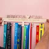 Laser Cut and Laser Engraved Wooden Personalised Couples Medal Hanger with both first names, a heart and an engraved message