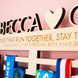 Wooden Personalised Couples Medal Hanger with both first names, a heart and an engraved message