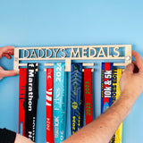 Laser Cut Personalised Minimal Wooden Medal Hanger featuring 'DADDY'S MEDALS' cut out above the Medals hanging below
