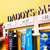 Detailed view of Personalised Wooden Medal Hanger with four dry wipe sections to record personal best times for four events