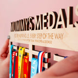 Side view of Personalised Medal hanger with 'Mummy's Medals' on top, showing the highly accurate detailed engraving