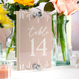 Table number 14 with floral decorations on a table